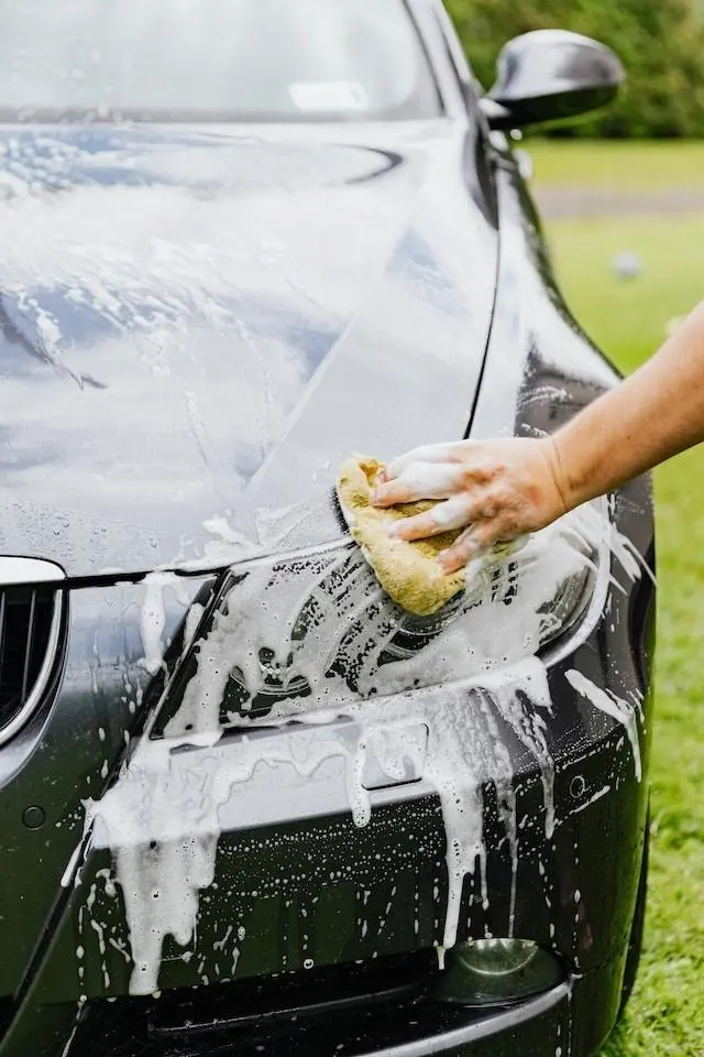 Image of Car Headlights being Washed