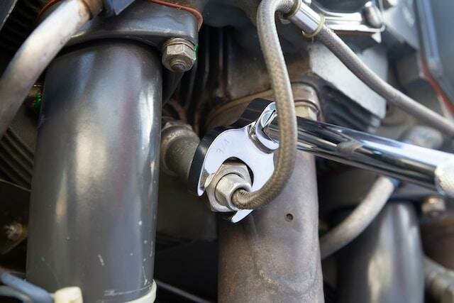 Image of a car engine being repaired