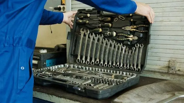 Image of a Mechanic with his tools