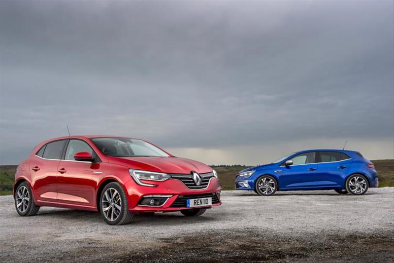 The_New_Renault_Megane_Is_the_Cheapest_Family_Hatch_to_run. Two new Renault meganes one facing front and one rear