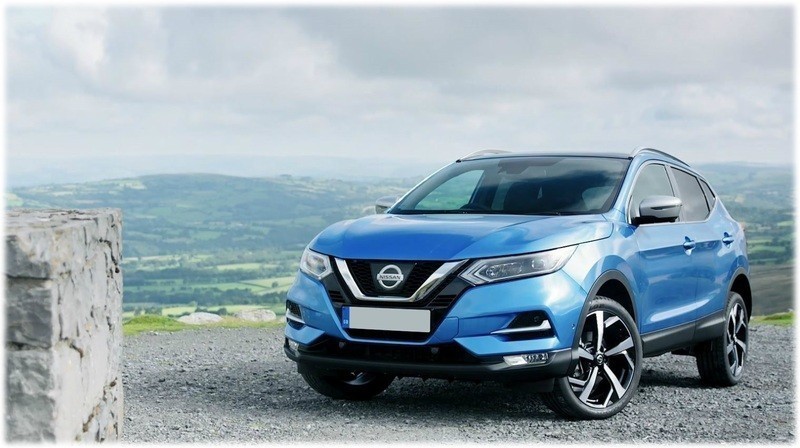 The New 2018 Qashqai sat ontop of a hill next to a wall with more countryside 