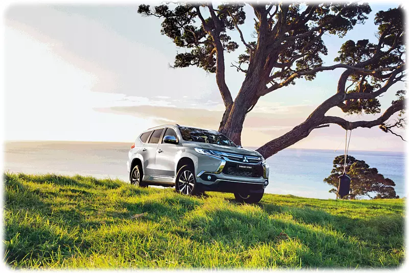 The new 2018 Shogun Sport sat in a field at sunset 