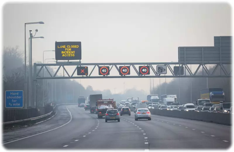 Smart Motorway in operation following an incident with a lane closure displayed on the gantry