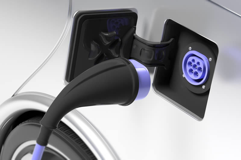 close up of plug in car charging