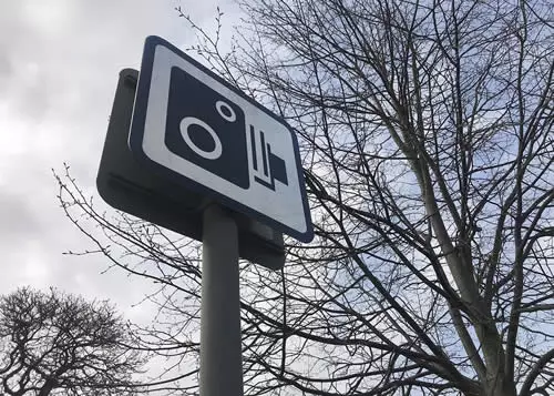 speed camera warning sign