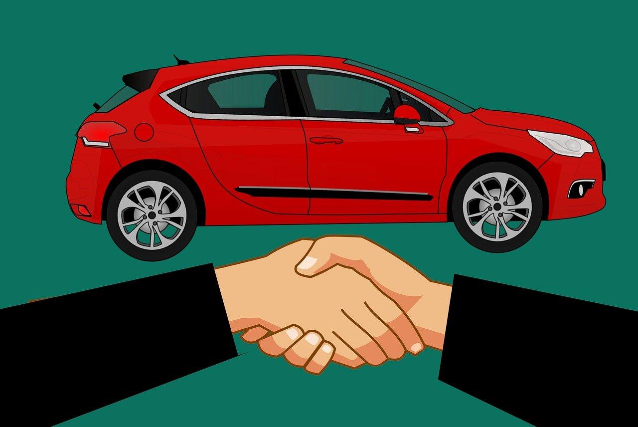 Image of a New Car and customers shaking hands