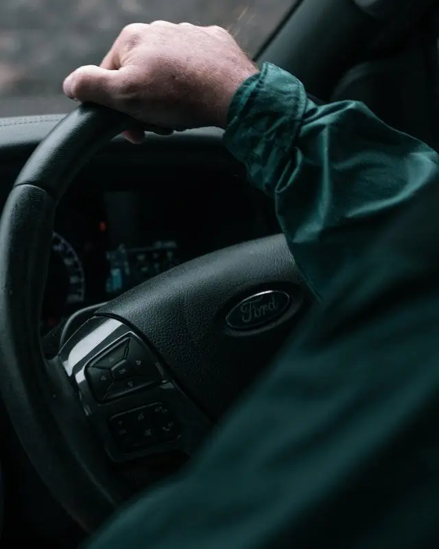Image of a Man Driving a Ford S-Max Car