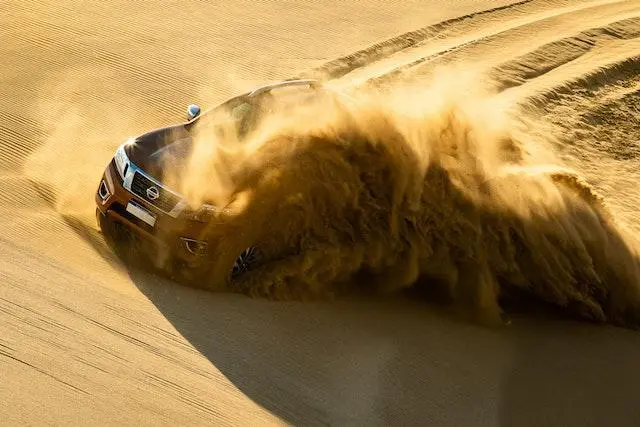 Image of a Nissan Qashqai on the Sand
