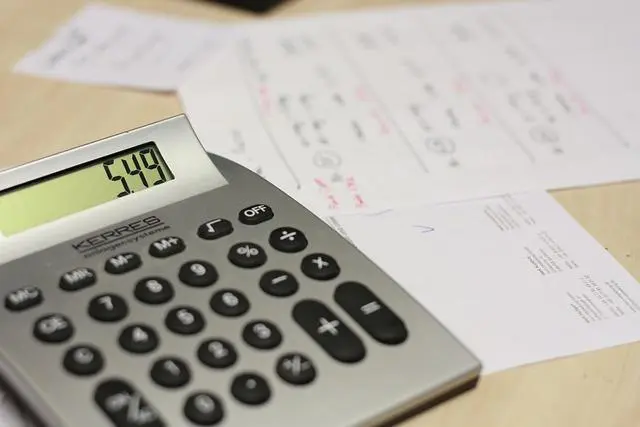 Image of an Invoice and Calculator