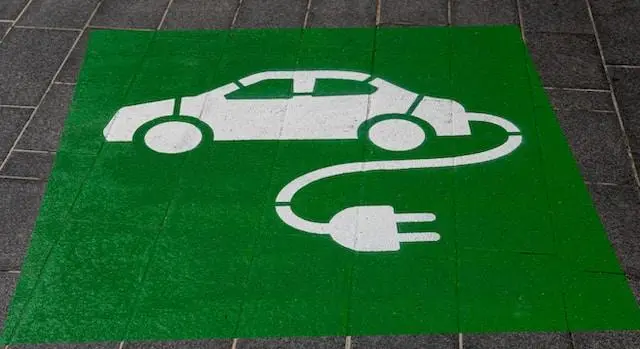 Image of a Green Plug in Hybrid Car Logo