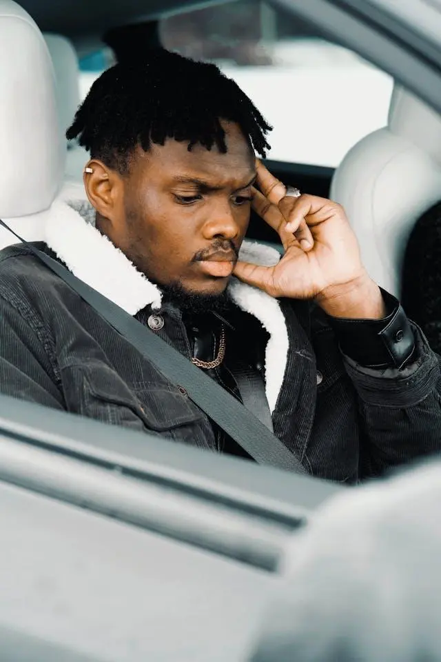 Man Wearing a Car Seatbelt
